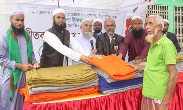 সিলেটের কানাইঘাটে দরিদ্র শত মানুষ পেল নুরুল ইসলাম ফাউন্ডেশনের শীতবস্ত্র